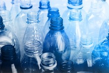 Plastic Bottles Of Water Isolated On Background