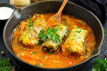 Wall Mural - Ukrainian traditional dish with cabbage and stuffed cabbage. Selective focus.