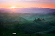 © Alvaro Sanchez/ADDICTIVE STOCK - Picturesque landscape of green fields with cottage and trees in bright sunset light, Italy