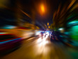 © kaisorn - Abstract speed motion blur in city on night road and neon light.