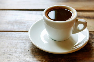 Sticker - Cup of coffee on brown wooden table