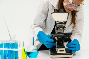 young woman scientist working in chemical laboratory and examining biochemistry lab sample. science 