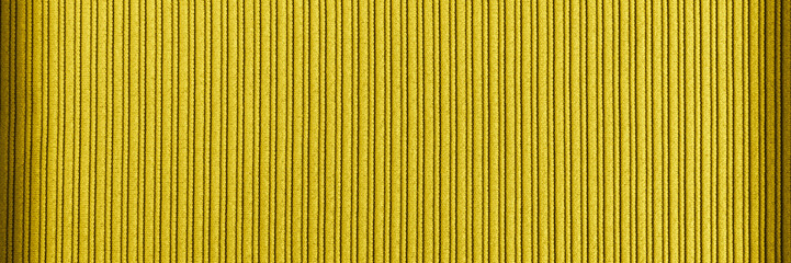 Decorative background yellow color, striped texture vignetting gradient. Wallpaper. Art. Design.