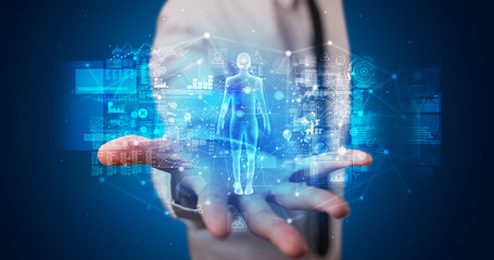Poster - Young person holding hologram projection displaying health related graphs and symbols

