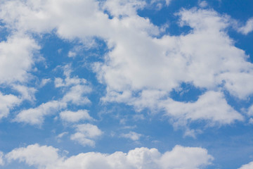 Blue sky white cumulus clouds background