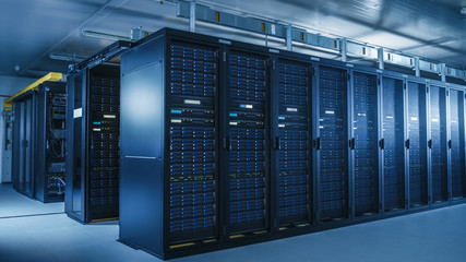 Wall Mural - Shot of Modern Data Center With Multiple Rows of Operational Server Racks. Modern High-Tech Database Super Computer Clean Room.