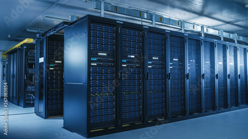 Shot Of Modern Data Center With Multiple Rows Of Operational