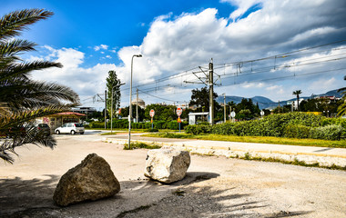 two big rocks in the middle of the street