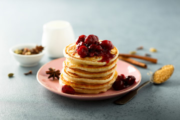 Wall Mural - Homemade pancakes with spicy cherry sauce