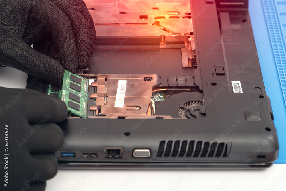 Engineer makes dismantling of RAM for disassembling and repairing a ...