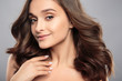 © cherry_d - Brunette girl with healthy curly hair and natural make up . Beautiful model woman with wavy hairstyle .Care and beauty