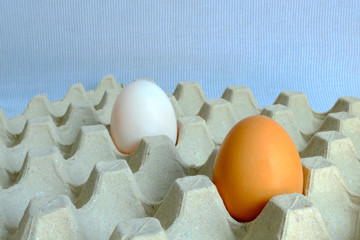 Duck egg and chicken egg put on paper tray