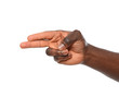 © New Africa - African-American man showing shoot gesture on white background, closeup