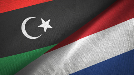 Libya and Netherlands two flags textile cloth, fabric texture