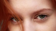 Closeup Of Pretty Red-hair Woman With Green Eyes