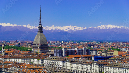 Fotomural Turin, Torino, aerial timelapse skyline panorama with Mole Antonelliana, Monte dei Cappuccini and the Alps in the background