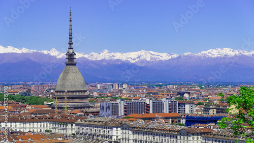 Photo  Turin, Torino, aerial timelapse skyline panorama with Mole Antonelliana, Monte dei Cappuccini and the Alps in the background