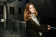 © Pavel - beautiful girl in coat with scarf walks on city street, portrait of woman resting outdoors
