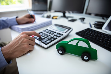 Close-up Of Car In Front Of Accountant