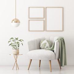 Wall Mural - Poster mockup with three frames on empty white wall in living room interior with gray velvet armchair, round pillow with tropical pattern, green plaid and plant in basket. 3D rendering.