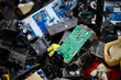 © chatdanai - electronic circuits garbage as background from recycle industry