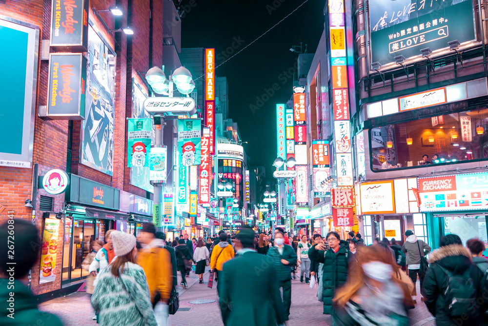 TOKYO,JAPAN - February 22, 2019 : Blurred people walking in  Shibuya  street , Japan - obrazy, fototapety, plakaty 