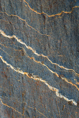  Blue gray stone with white and orange lines of pattern and texture as a nature background