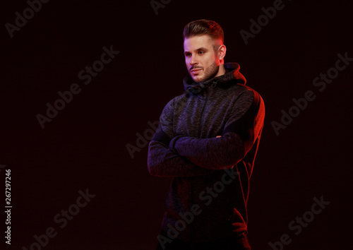 Muscular Model Young Man With Beard In Black Hoody On Dark
