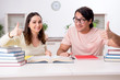 © Elnur - Students preparing for exam together at home