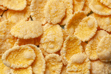 Cornflakes Dry Breakfast. Yellow Flakes Texture Closeup.