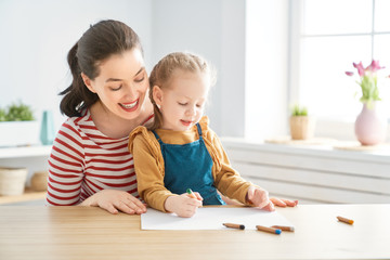 Mother and daughter drawing