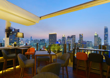 Bangkok City View Point From Rooftop Bar, Overlooking A Magnificent Cityscape Blue Sky And City Light, Thailand 
