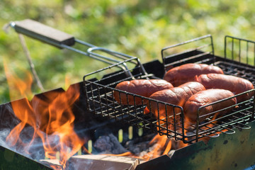 barbecue meat on the fire unopened. summer picnic in the country.