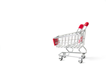 Closeup shopping cart for e-commerce or shopping concept on white background.