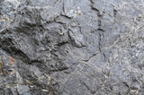 Fototapeta Desenie - Rock texture and surface background. Cracked and weathered natural stone background.