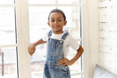 Portrait Of Confident Handsome Dark Skinned African Boy With Short