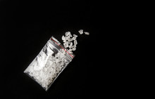 Conceptual Image Of "bath Salts" Drugs Narcotics Concept. White Crystal Powder On Black Background( Set Up), Resemble To Bathroom Bath Salt.