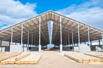 the roof of the large shed is insulated with insulation panels. modern construction with the use of 