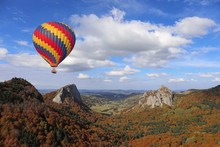Hot Air Balloon Flying Over Volcano Landscape In Puy-de-dome Auvergne France