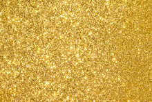 Sparkles Of Golden Glitter Abstract Background	