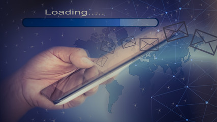 hands that touch the mobile phone with a data link society on the map
