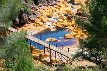 Wall Mural - The Rio Tinto River located in Spain was died red due to mineral runoff from natural sources and local mining.