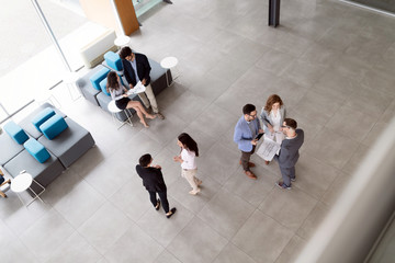 Wall Mural - business coworkers discussing new ideas and brainstorming in a modern office