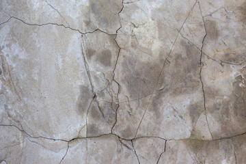 background gray concrete wall with cracks with copy space