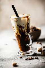 Poster - Iced coffee in a tall glass with cream poured over