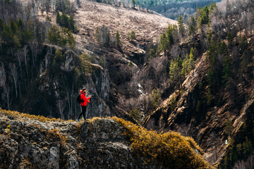 Photographer in the mountains. Traveler in the mountains. Photo tours. Camping trip. Tours in the mountains. Professional photographer. National Geographic. Photojournalist. Photo artist