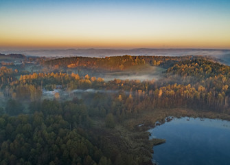 Wall Mural - Sunrise, lakes, forests and a beautiful landscape - drone view