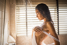 Portrait Of Sexy Woman In Shower With Drops And Splash Of Water. Attractive Young Asian Girl Showering In Bathroom. Health Care Sexy Relax Fresh Lifestyle Vintage Concept