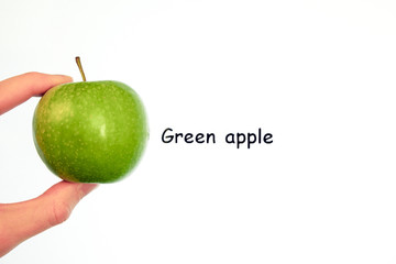 a green apple on a white background and the inscription 