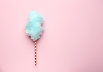 Wall Mural - Tasty cotton candy on color background